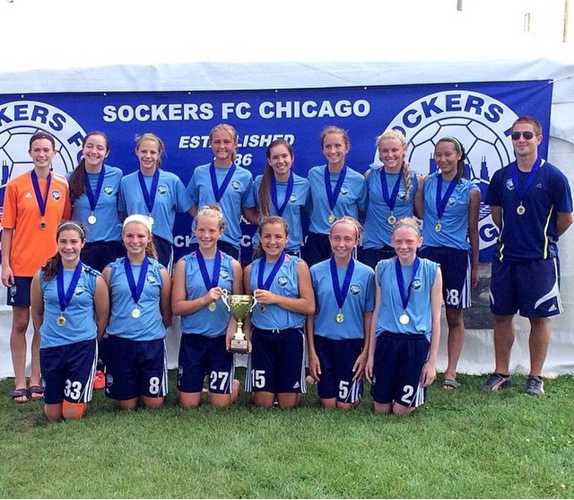 Chris, on the Soccers FC Chicago girls team photo as coach
