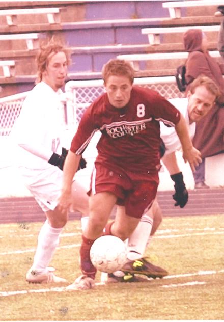 Chris playing soccer for Rochester college