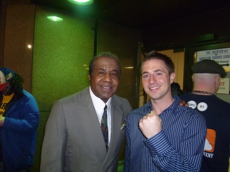 Chris posing with boxing celeb