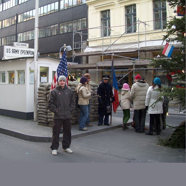 Chris, standing outside a U.S. army checkpoint